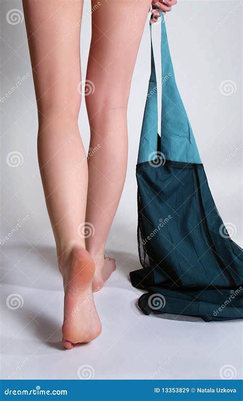 Beautiful Long Feet Of The Undressing Girl Stock Image Image Of