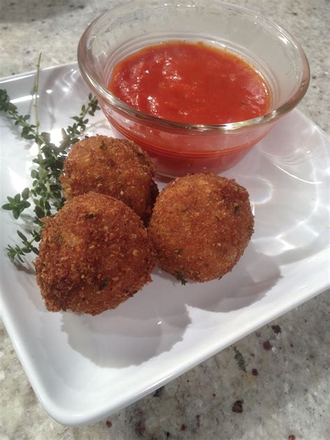 Dip them in breadcrumbs and fry, a few at a time, in hot oil until golden brown. RECIPE: ARANCINI (ITALIAN RICE BALLS) WITH HOMEMADE ...