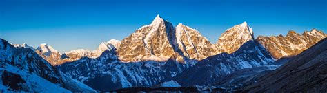 Glorious Mountain Sunrise Golden Light On Himalayan Peaks Panorama
