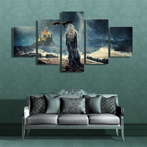 A Living Room Scene With A Couch And Paintings On The Wall Including