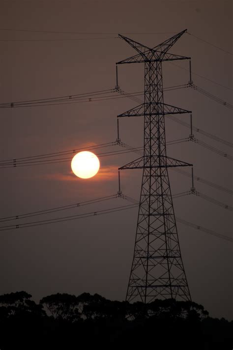 The Sun Trying To Get Through Smoke Transmission Tower Moon Lovers