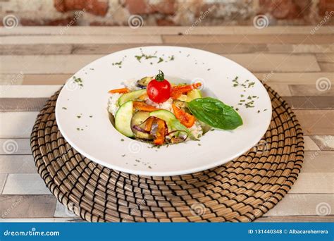 A White Plate With Rice And Fresh Vegetables Stock Photo Image Of Culinary Onion