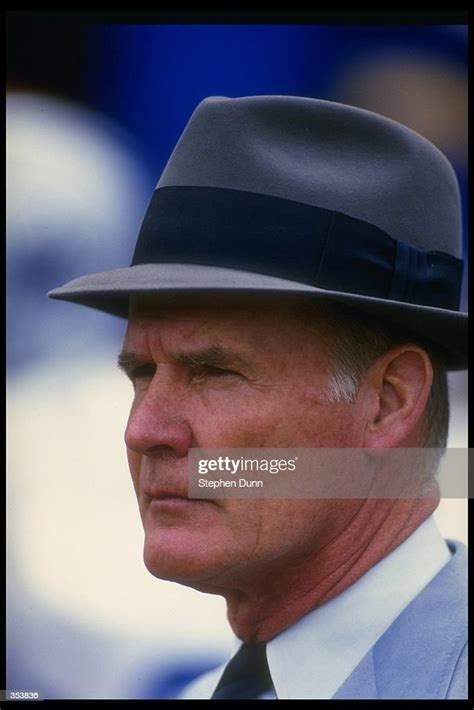 Dallas Cowboys Head Coach Tom Landry Looks On During A Game Against