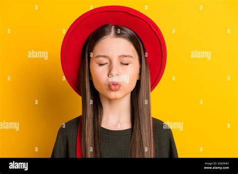 Photo Portrait Of Little Girl With Pouted Lips Sending Air Kiss Dreamy