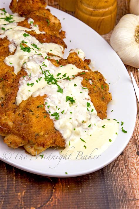 Do not move the chicken or start checking for doneness until it has fried for at least 3 minutes, or you may knock off the coating. Chicken with Creamy Garlic Sauce - The Midnight Baker