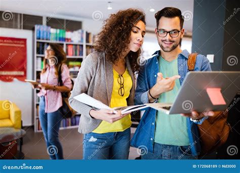 Group Of College Students Studying In The School Library Stock Image