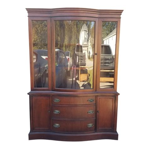 Maybe you would like to learn more about one of these? 1950s Bassett Furniture Bow Front China Cabinet | Chairish