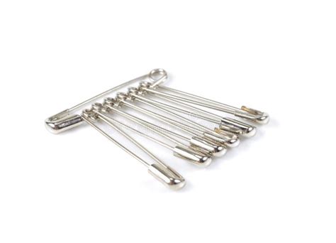 Bunch Of Safety Pins On White Background Shiny Metal Safety Pin Stock