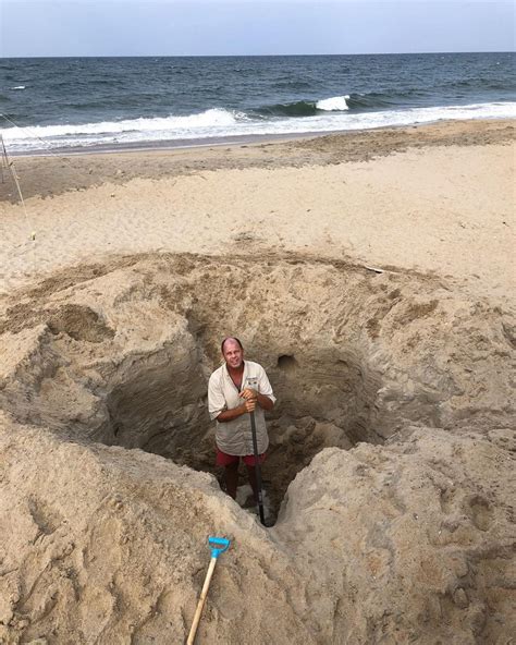 dangers of digging deep holes on the beach