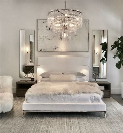 Amazing bedroom designs in white that are so peaceful and relaxing, some of them can be totally white, while others can have some color accents. Luxury bedroom with white bed, white walls, chrome assents ...