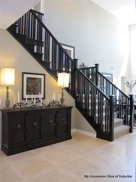 When considering a new staircase, think about your family members and how they use the stairs to make the best choice because each kind has advantages and disadvantages. Black and White Model Home Tour | Home, Black staircase, House