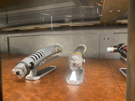 photos ahsoka tano legacy lightsabers back in stock at dok ondar s den of antiquities in disney