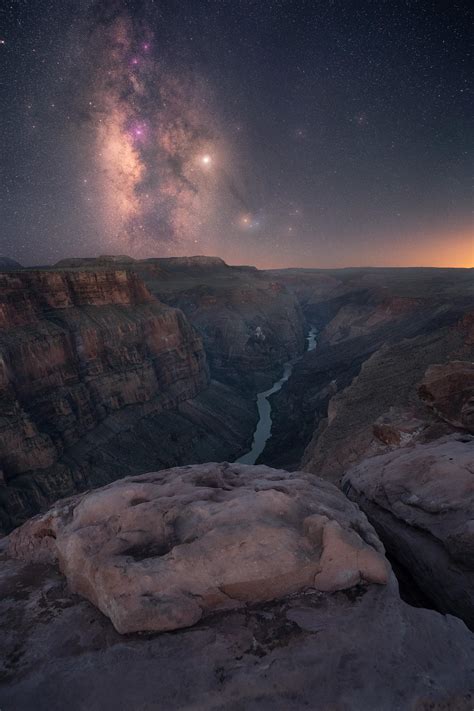 A Long Exposure Of The Milky Way Flying High Above The Grand Canyon In