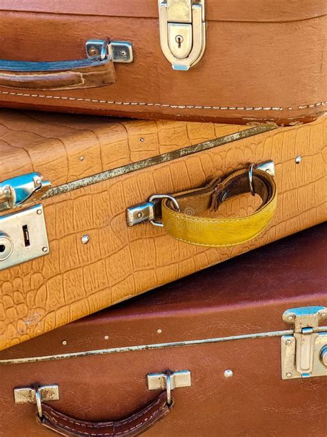 Vintage Leather Suitcases Are Stacked Close Up Copy Space Stock Photo