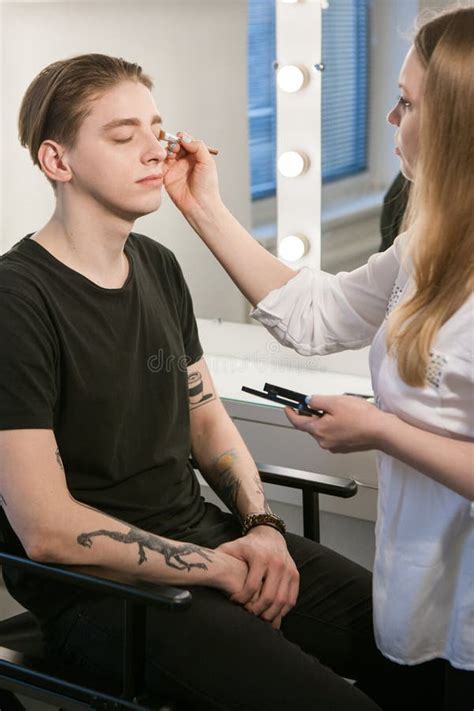 Beautician Applying Cosmetics On Man`s Eyes Stock Photo Image Of