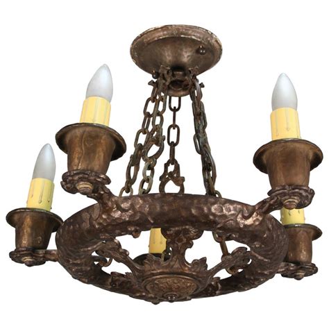 Beautifully handcrafted in india of glass and metal with an antiqued finish, this exquisite lantern can be hung high up from a hook. Antique 1920s Spanish Revival Tudor Style 5-Light ...
