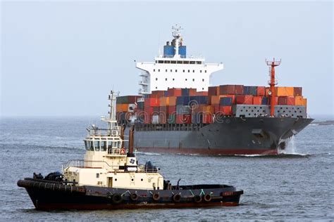 Container Cargo Ship With Ocean Tug Stock Photo Image Of Port Bulk