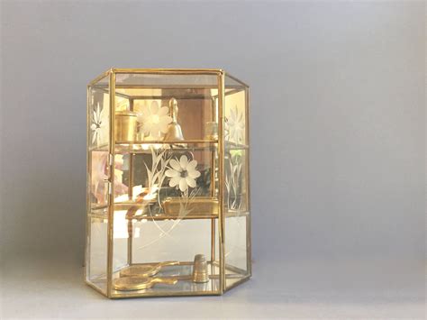 Brass And Glass Curio Cabinet Etched Flowers Etsy Glass Curio Cabinets Brass Decor Glass