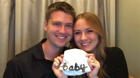 Wife Surprises Husband With Pregnancy Announcement During Photo Booth