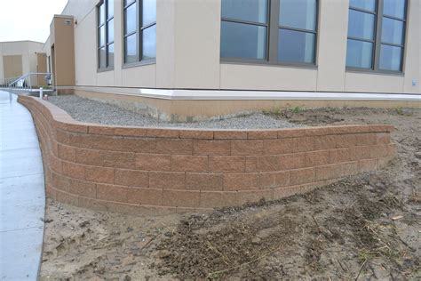 Installing Retaining Wall Corners And Wall Caps