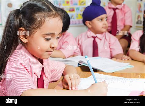 Indian School Childrens Students Book Studying In Classroom Stock Photo