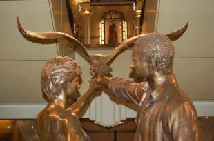 The couple are shown dancing in mediterranean waves beneath the wings of an albatross, which. London store Harrods to remove Diana statue