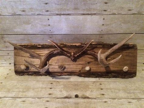 The moose antler coat rack is in the shape of two moose antlers, one smaller than the other. Cabin аnd Rustic Decor | Deer antler decor, Deer hunting ...