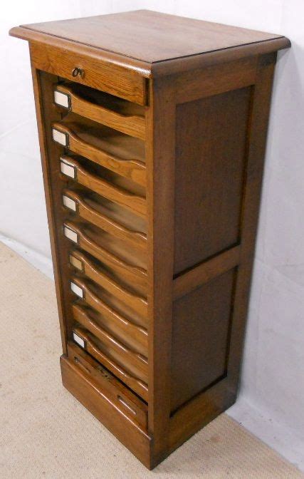 Makes it easy to sort and store important papers. Roll Front Filing Cabinet | online information