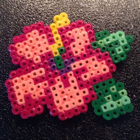 We made up a batch of these easy perler bead gift patterns which are small and cute designs. Hibiscus flower perler beads by perler_daily (With images ...