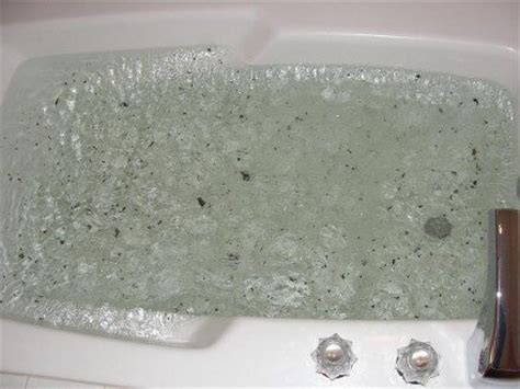 For cleaning a jetted tub with vinegar, fill the hot tub with water, covering the jets with approximately two inches of hot water. Whirlpool Maintenance