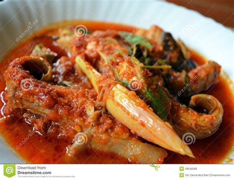 Sour and spicy) is a maritime southeast asian sour and spicy fish stew dish. Malay Cuisine - Asam Pedas Ikan Pari Stock Photo - Image ...