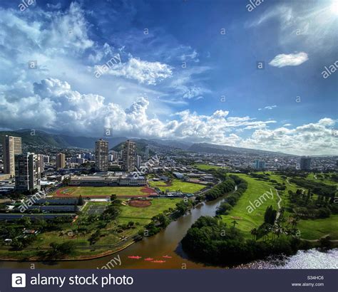 Honolulu Hawaii Landscape With Clouds Coming Over The Koolau Mountain