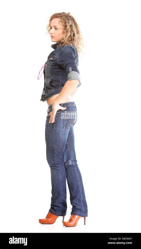 Beautiful Young Woman Blonde 20s Standing Full Body In Jeans Wear