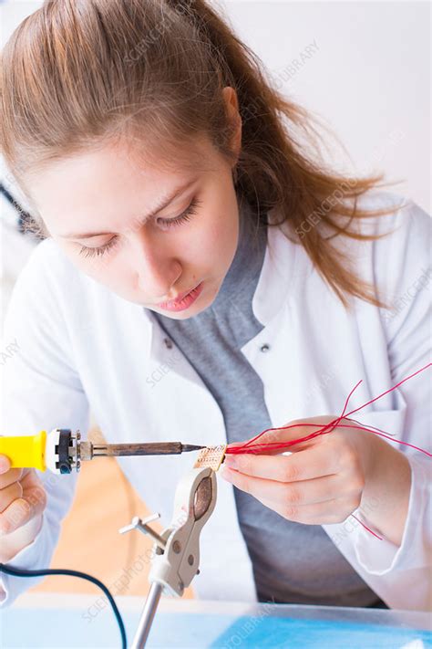 Girl Using Soldering Iron Stock Image F0172206 Science Photo Library