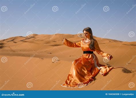 A Girl In A Beautiful Moroccan Dress Merzouga Morocco Stock Photo