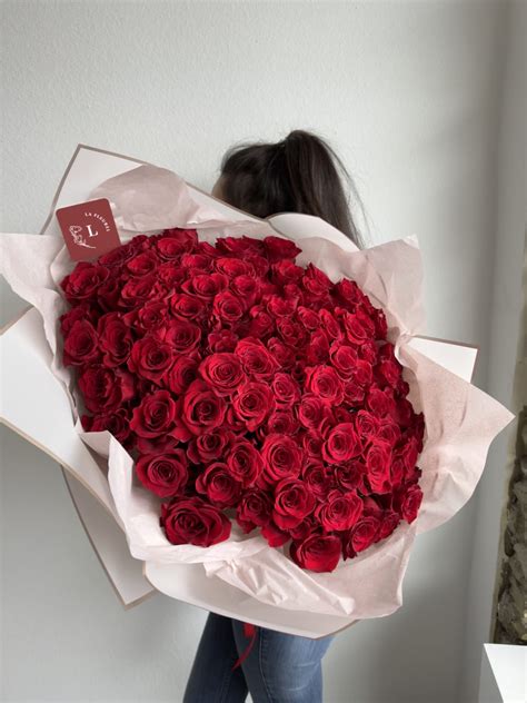 100 Red Roses Wrapped Bouquet By La Fleurel