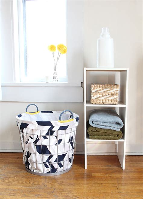 White laundry hamper laundry room organization small laundry laundry rooms laundry bags laundry area small storage diy storage storage easy to pull out drawers with stoppers at the back and supportive panels on the bottom. DIY to try # Laundry hamper - Ohoh deco