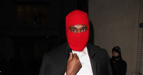 Kanye West Wears Red Ski Mask To Margiela Paris Fashion Week Show