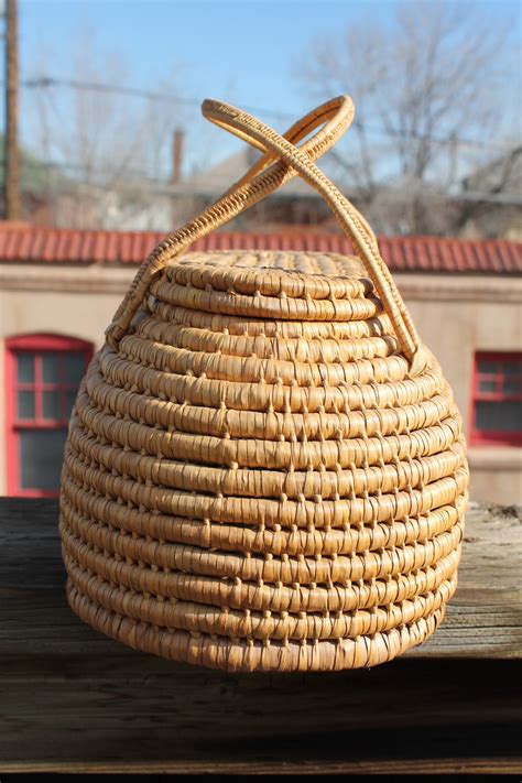 The most common cane lidded basket material is wicker. Wicker Basket with Lid & Handles | Collectors Weekly