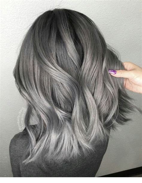 This blue hair color on a dark brunette is absolutely electric. Silver ash hair color | Grey hair color, Spring hair color ...