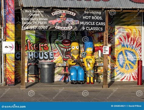Homer Marge And Maggie Simpson Statues Used As Part Of Signage For Strokers In Dallas Texas