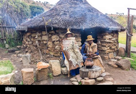Basotho Cultural Village Rural Scene With Two Black African Men Dressed