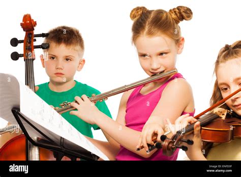 Group Of Cute Kids Playing On Musical Instruments Stock Photo Alamy