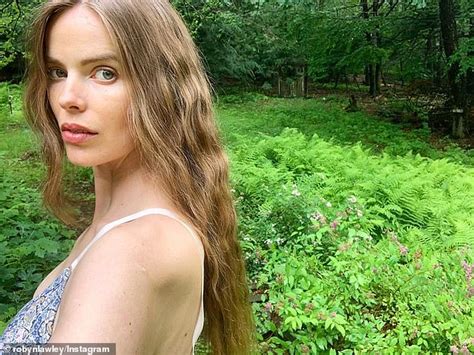 model robyn lawley poses topless as she flaunts her incredible curves and her new haircut