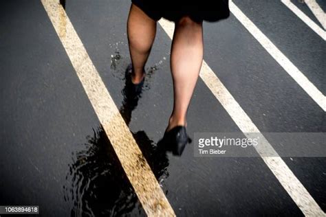 high heels puddle photos and premium high res pictures getty images