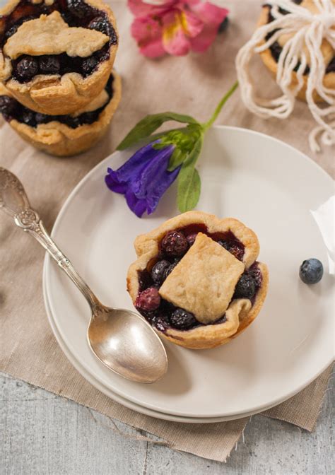 Fill each pie crust with your blueberry mixture and dot it with butter. Mini Blueberry Maple Pies