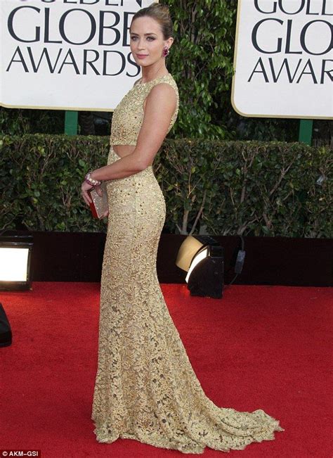 Going For Gold Emily Dazzled In A Gold Cutout Gown By Michael Kors At The Golden Globes Last