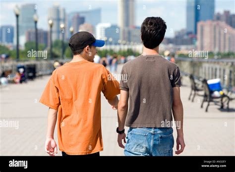 Two Teenage Boys Spend Time Together Walking And Talking With New York