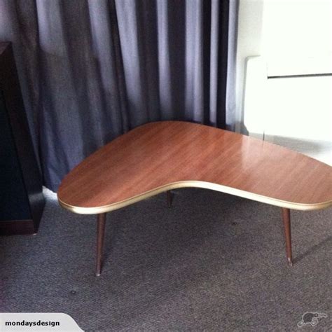 The veneered top is supported by three angled legs. RETRO KIDNEY BEAN COFFEE TABLE | Coffee table, Coffee ...