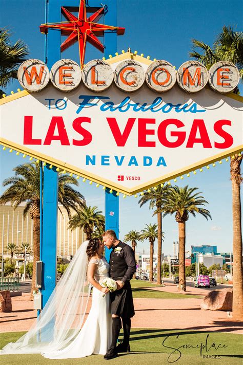 Las Vegas Destination Wedding With Bride And Groom At Las Vegas Sign Getting Marr Vegas